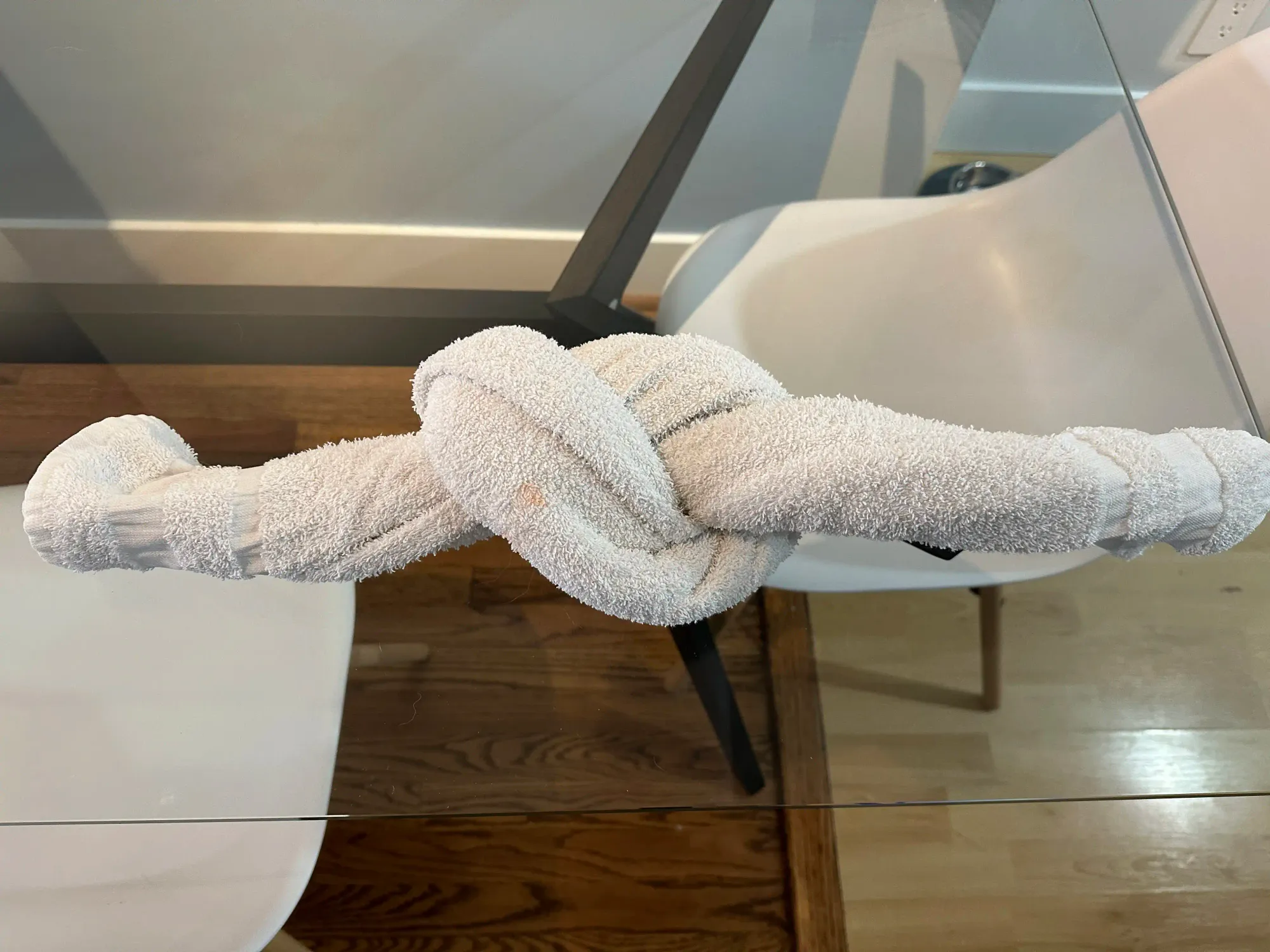 A towel with a knot in the center.