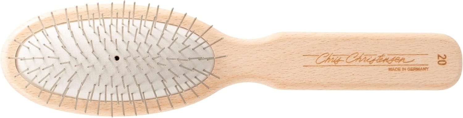 A wood pin brush meant for dogs.